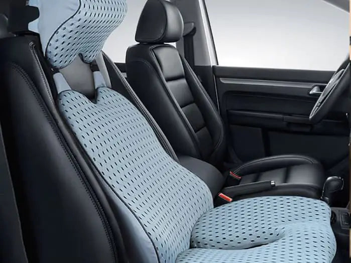 Exquisite car interior complemented by posh seat coverings.