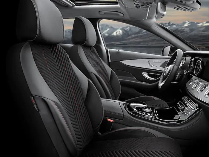 The inner elegance of a car adorned with lavish seat covers.